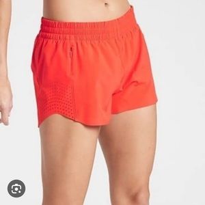 Athleta Hustle 3” red-orange shorts size XS